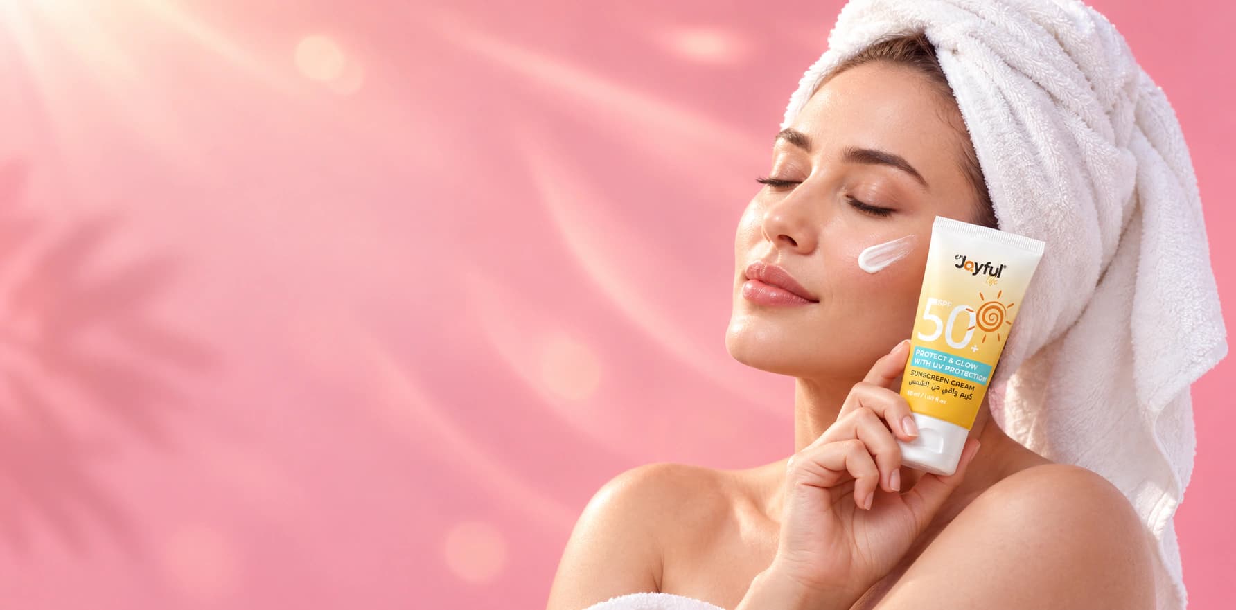 Woman holding Enjoyful Life SPF 50+ sunscreen